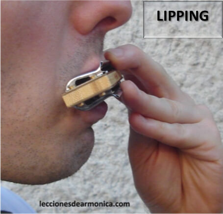 harmonica lip-blocking: lipping